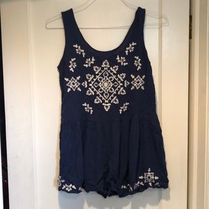 Navy romper with cream embroidering size M